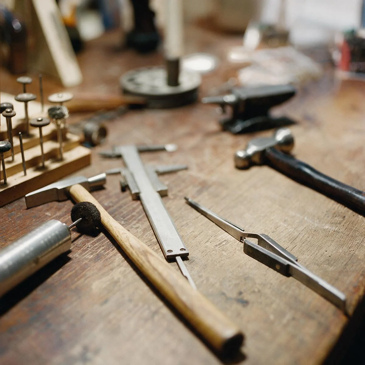 Jewellery tools laid out on the workshop bench